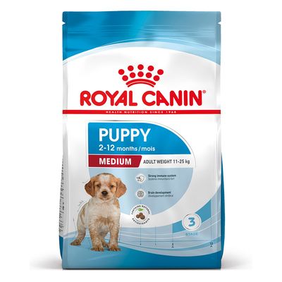 Crocchette per cucciolo di taglia media Royal Canin, marca AGRIAPPIA, in una ciotola con crocchette dorate.